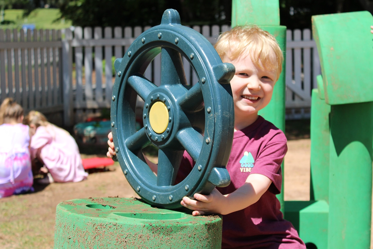 boy-playing-on-playground-raleigh-glenwood-daycare-spanish-for-fun-copy-2