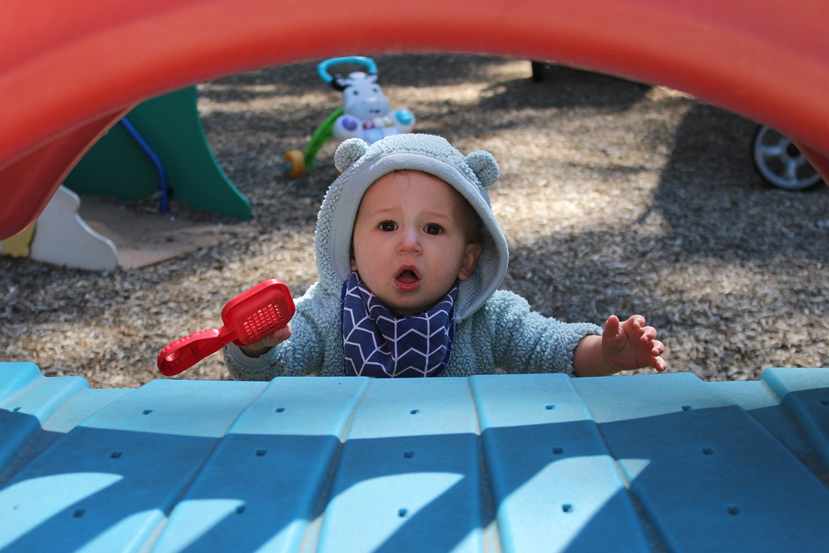 cute toddler on playground - Raleigh Duraleigh daycare SPANISH FOR FUN copy