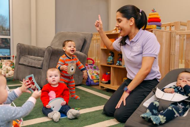 Teacher with babies SPANISH FOR FUN!