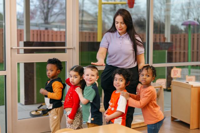 Teacher with kids SPANISH FOR FUN!